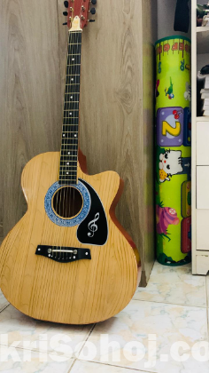 (USED)Guitar with a Bag and Free Capo at very low Price